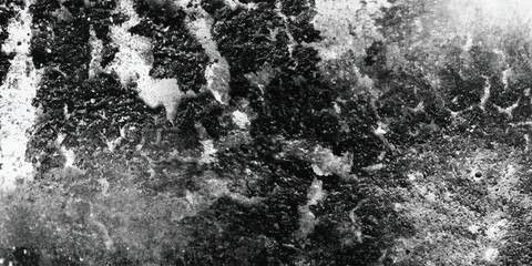 An abstract and visually arresting composition emphasizing the granular and somewhat abrasive nature of a surface in monochrome.
