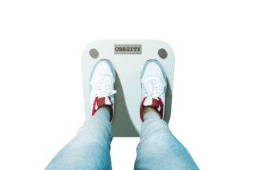 Person in sneakers and sweatpants standing on a scale reading obesity, closeup on white background, concept of health and weight awareness