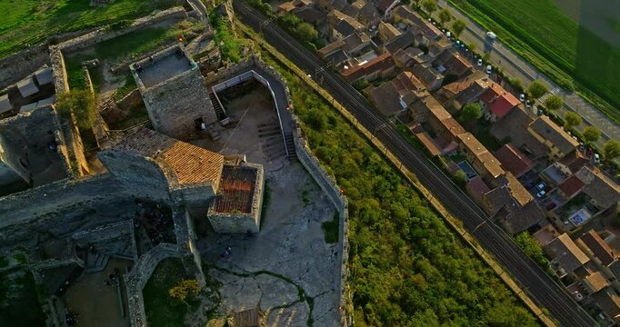 Mornas Fortress stands majestically on top of a rocky cliff. The Fortress of Mornas is a medieval fortress above the village of the same name in the French department of Vaucluse