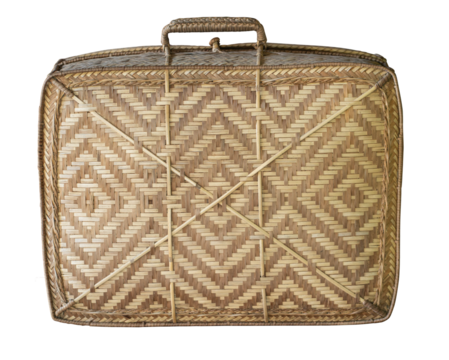 Old brown suitcase with a woven handle sits on transparent background.