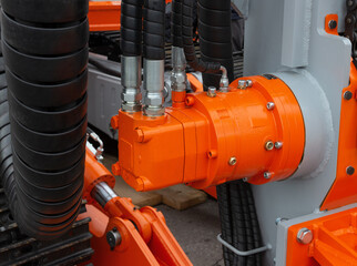 Power fittings hoses and tubes on hydraulic piston of lifting machine