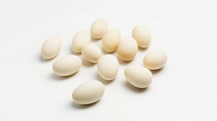 Group of white eggs on clean background, minimalist food arrangement