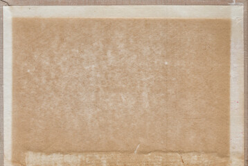 Vintage background of old ancient torn paper texture