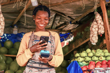 excited young sales person accepting digital payment of clients