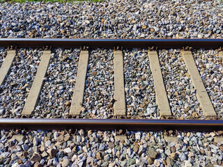 top angle railway tracks in gravel
