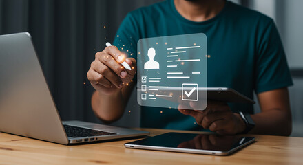 Person using digital tablet and stylus to fill out online application form