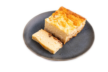 Сottage cheese Сasserole, Curd cake, with dried apricots and raisins Isolated on white, side view, close up