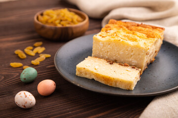 Сottage cheese Сasserole, Curd cake, with dried apricots and raisins on brown wooden, side view, selective focus