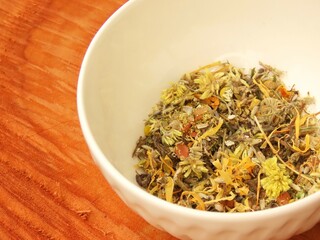Ceramic bowl with a mixture of dried herbs and also pink salt for numerous uses. Mixture of dried lavender, calendula, chamomile, macela (as known in Brazil) for foot bath, bath recipes or body soak. 
