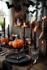 Obraz premium Halloween Table Decorations with Black Candles, Pumpkins, Bats, Spooky Theme
