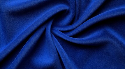 Fototapeta premium A close-up of smooth, shimmering blue fabric, showing intricate folds and textures that highlight its luxurious appearance.