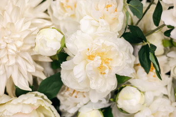 Obraz premium Floral background with artificial flowers close-up.