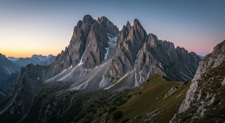 Obraz premium Majestic Dolomites at Sunset: A breathtaking panoramic view of the towering peaks and valleys of the Italian Dolomites during a serene sunset.