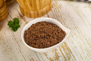 Brown flax seeds in the bowl