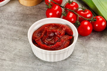 Red tomato paste in the bowl