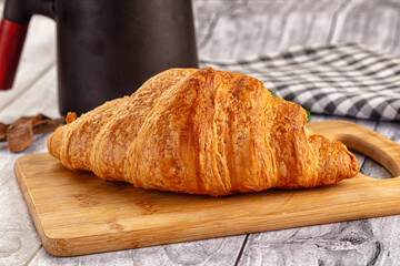 Fresh hot homemade croissant for breakfast