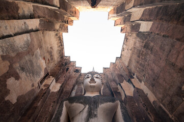 Pra Ajana buddha statues Sri​ Chum​ Temple in Sukhothai Historical Park World Heritage Site