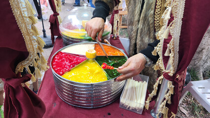 Colorful Ottoman paste candy, known as Osmanlı macunu in Turkish, delights children with its vibrant hues and sweet flavors, reflecting a playful touch of historical tradition.