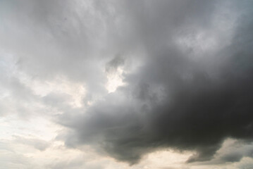 Dramatic dark storm thundercloud rain clouds on black sky background. Dark thunderstorm clouds rainny landscape. Meteorology danger windstorm disaster climate. Dark cloudscape storm disaster gray sky