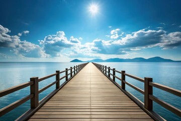Obraz premium Serene wooden pier extending into a tranquil blue sea under a bright sun and fluffy clouds.