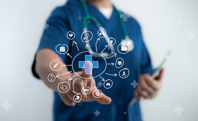 Doctor in blue uniform interacts with virtual medical icons representing a connected healthcare network system