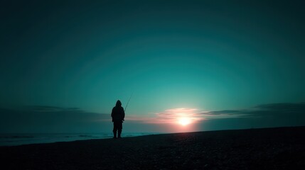 A solitary figure stands on the beach during dawn, holding a fishing rod. The soft light of the rising sun creates a tranquil atmosphere over the water, signaling a new day of fishing