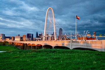 Downtown Dallas, TX behind the Margaret Hunt Bridge at Dusk 