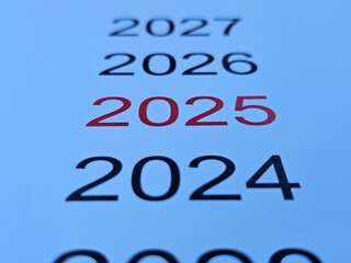 Calendar pages display years from 2022 to 2027 with 2025 highlighted in red for upcoming focus and planning concept