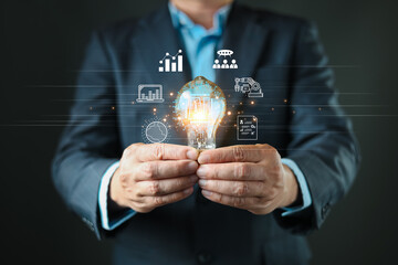 innovation technology big data and business process strategy. man hold lightbulb Ai icon. customer service management.Digital transformation change management.cloud computing.Ai technology