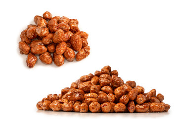 Tasty sweet roasted peanuts isolated on a white background.