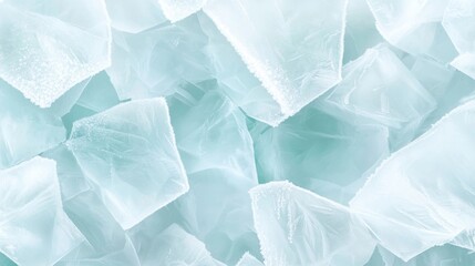 Obraz premium A close-up view of many small, light-blue, translucent square objects, possibly plastic bags or packaging. The shapes and textures create an abstract pattern
