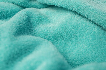 green towel fabric texture background close up