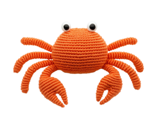 Cute orange crochet crab for playful decoration and gifts on a transparent background, cut out