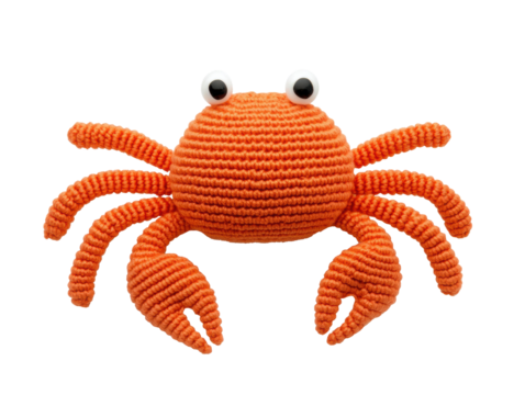 Cute orange crochet crab for playful decoration and gifts on a transparent background, cut out