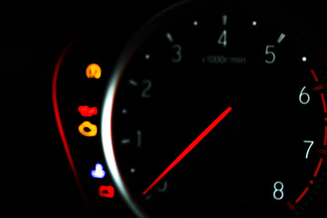 Blurry defocused Car miles or speedometer scoring with icon and number of car on dashboard. transportation concept.