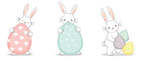 three white bunnies holding pastel easter eggs with heart