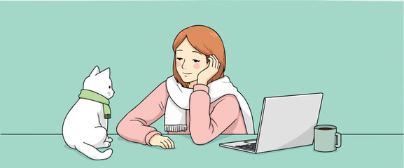 woman with cat working on laptop