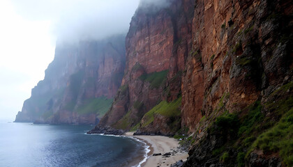 Majestic Cliffs and Beach on a Foggy Coastline Landscape Scenery