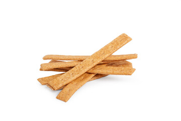 A heap of backed bread sticks on a white background with copy space