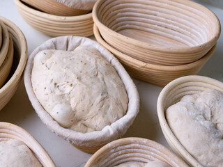 Sourdough Bread in Proofing basket, bannetons baskets for retarding raw dough before baking.