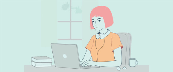 young woman working on laptop at home office desk