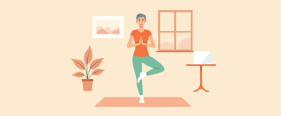 woman practicing tree yoga pose in a home setting