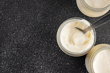 Skyr white yogurt appetizer dish fresh delicious gourmet food background on table rustic food top view copy space keto and paleo diet vegetarian food