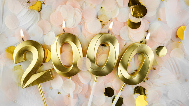 2000 followers card. 2k subscribers and online community fans. Social networks and blogs. Confetti background with candles number 2000 for social media celebration.