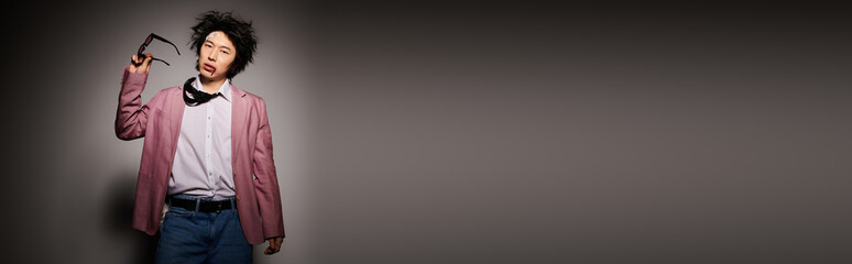 Stylish spring fashion showcase featuring an asian man in a studio environment