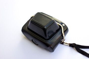 Black leather case for analog camera on white background.