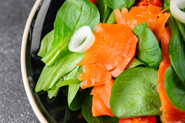 Salad salmon fresh seafood appetizer vegetables dish fresh tasty gourmet food background on table rustic food top view copy space 