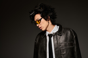 Stylish spring fashion showcase featuring an asian man in a modern studio setting