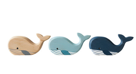 Obraz premium Three wooden whale figurines in different colors on a black background