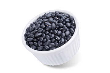 Black beans in a bowl on a white isolated background